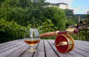 Mohlin reel and a glass of Brandy